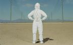 man wearing protective suit in desert 1 1