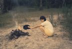 Woman warming Dog '69