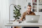 Man Sitting at Desk