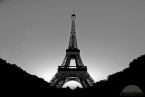 black and white shot of the eiffel tower epone