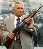 mikhail kalashnikov holding ak 47 ... (Click to enlarge)