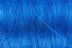 40200243 background texture and macro view of blue sewing yarn