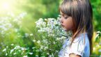 Cute Kid Holding White Flowers