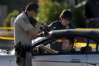 cop pointing gun