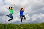 two kids jumping