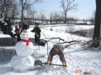 barefoot barefoot(!) making snowman