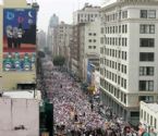 Pro immigration activists march down Broadway during a protest in down