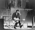 chuck berry b 1926 on stage playing everett